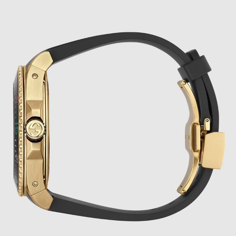 Gucci Dive Black Dial Gold Snake Motif YA136219. This timepiece has a gold coloured PVD 45mm case with black dial and Gucci snake motif. Featuring a black rubber strap secured by a gold coloured deployment buckle. Powered by a swiss made quartz