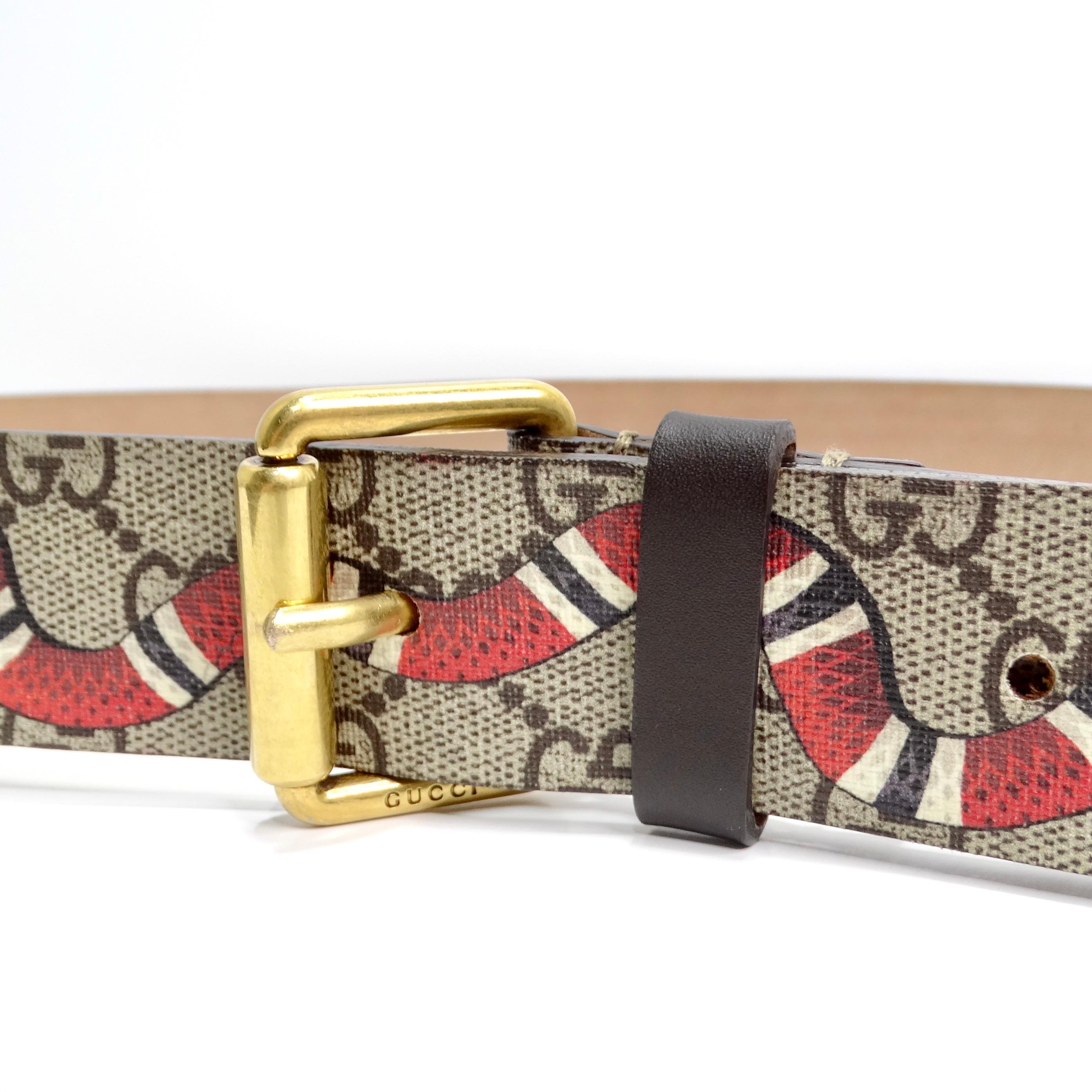 Introducing the Gucci Men's Monogram Snake Belt, a bold and stylish accessory that effortlessly blends classic design with contemporary flair. This belt features the iconic Gucci monogram canvas, known for its timeless appeal and sophistication,