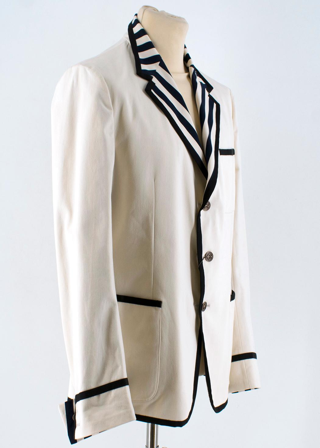 Gucci Men's New Palma Solid-to-Stripe Reversible Blazer

- Solid-to-Stripe reversible cotton-blend blazer
- Fully reversible to a solid beige & navy striped blazer
- Mid-weight
- Single breasted three buttons fastening
- Notch lapels
- Chest slip