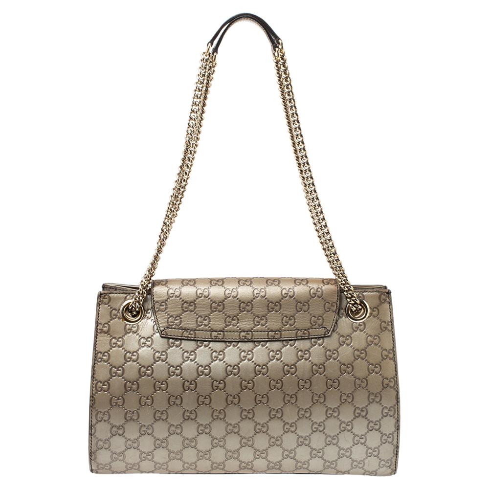 Gucci's handbags are not only well-crafted but they are also coveted because of their high appeal. This Emily Chain shoulder bag, like all of Gucci's creations, is fabulous and closet-worthy. It has been crafted from Guccissima leather and styled