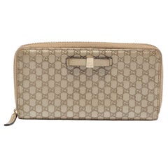 Gucci Metallic Beige Microguccissima Leather Bow Zip Around Wallet