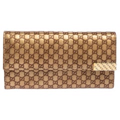 Gucci Metallic Beige Microguccissima Leather Dice Continental Wallet