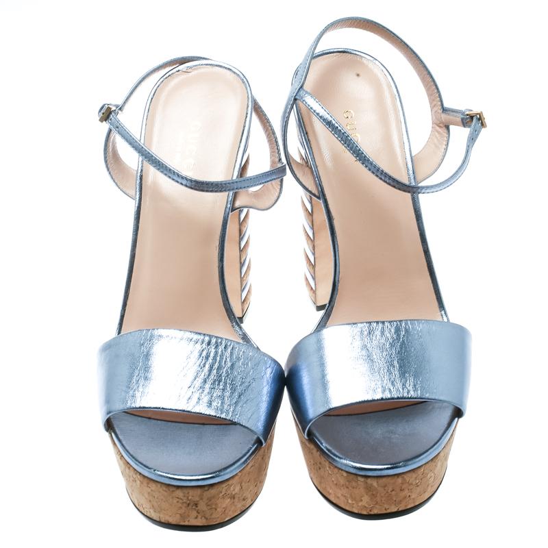 These sandals from Gucci will lend a stylish and playful edge to your feet. Crafted from leather, they are edgy and look fashionable and chic. Lined with strong and durable leather, these shoes are perfect for any season. This amazing pair of blue
