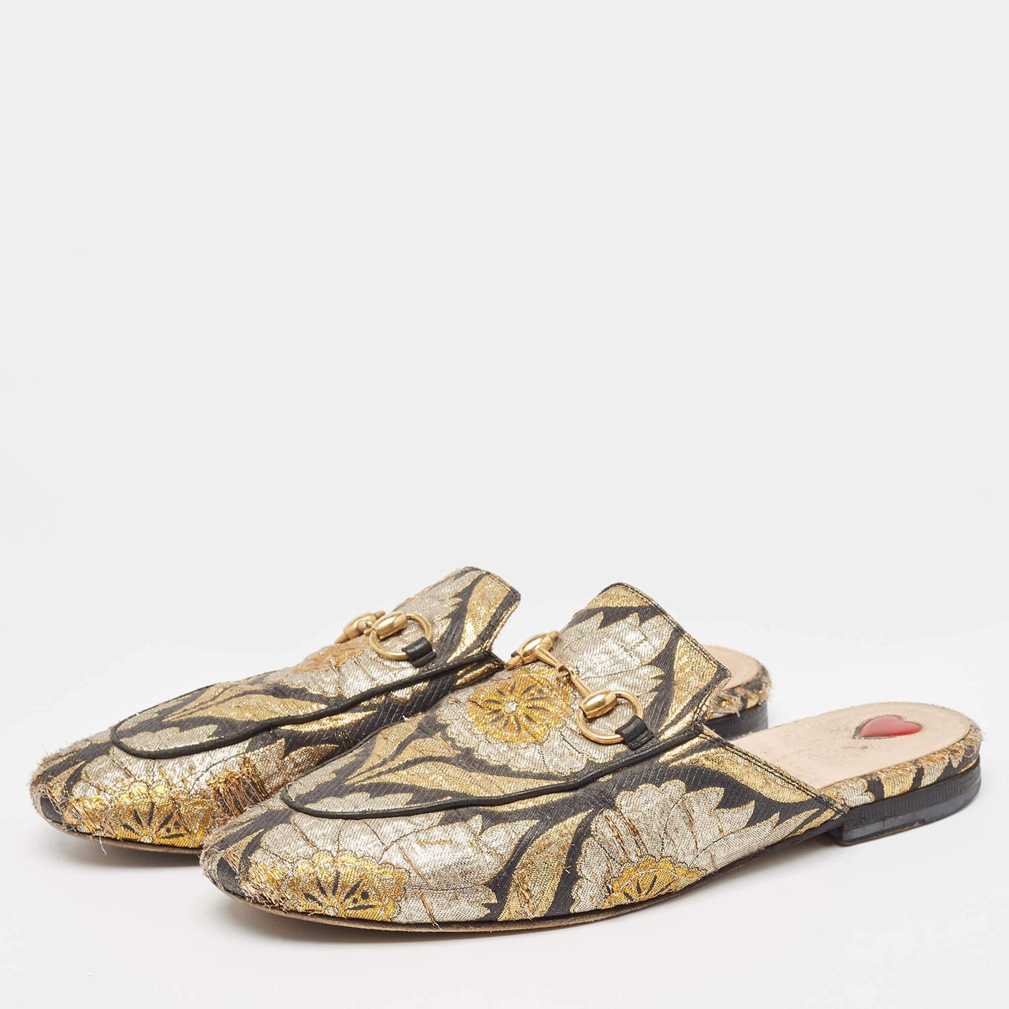 This popular pair of mules from Gucci looks even better on the feet. The shoes have an elegant design made from brocade fabric finished with the iconic Horsebit.
