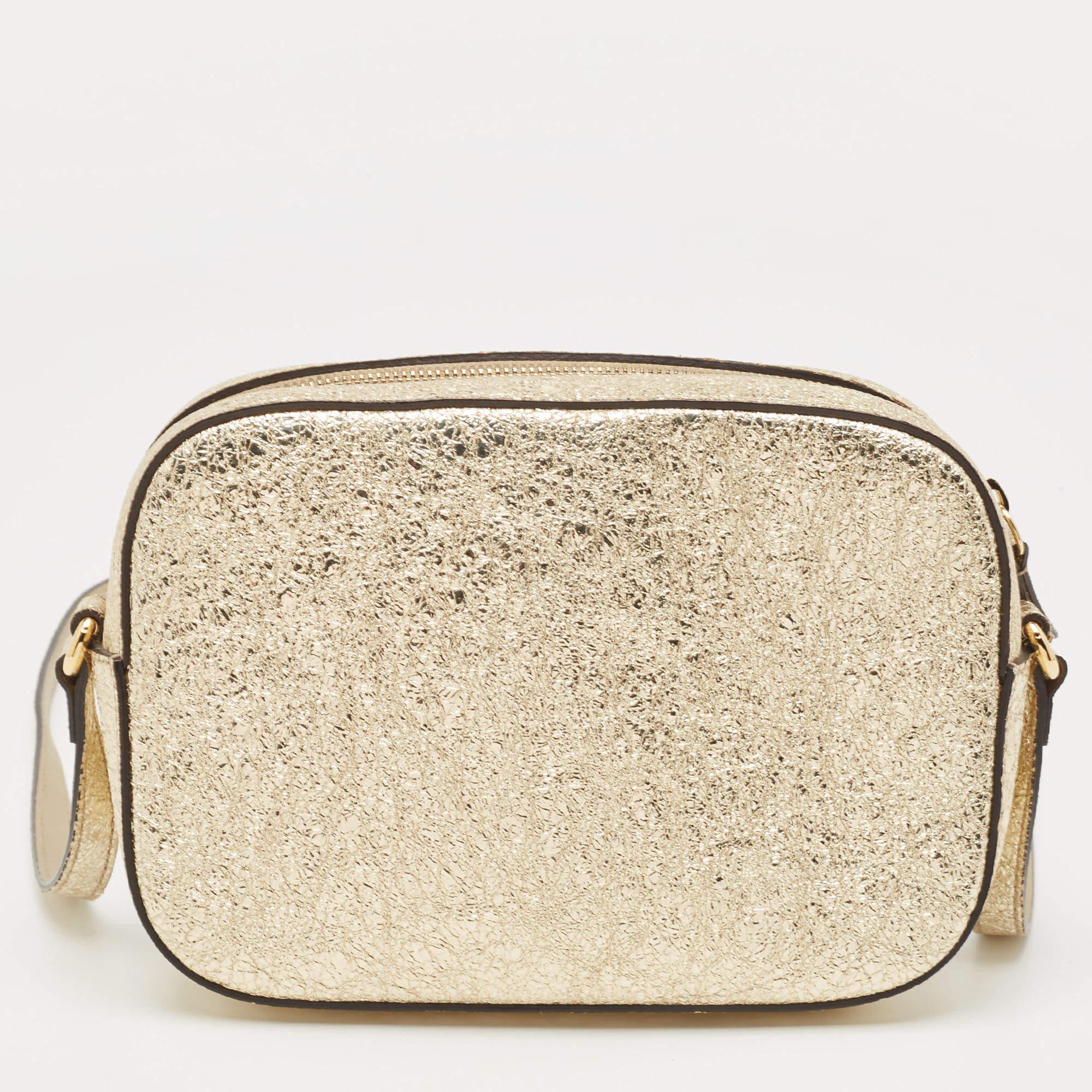Bags are more than just instruments to carry one's essentials. They tell a woman's sense of style and the better the bag, the more confidence she gets when she holds it. Gucci brings you one such fabulous bag meticulously made from metallic gold,