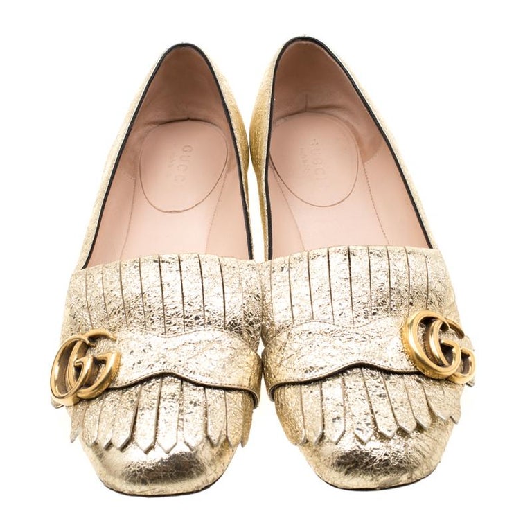 gold gucci flats