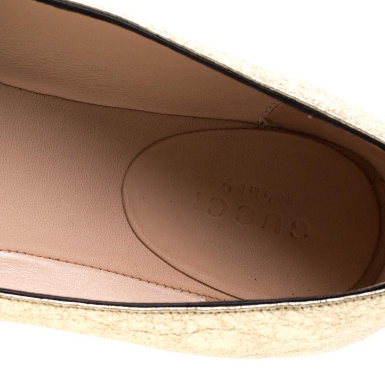 gold gucci flats
