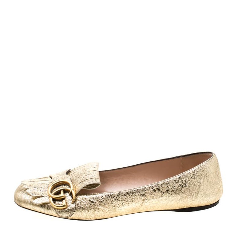 gold gucci flats