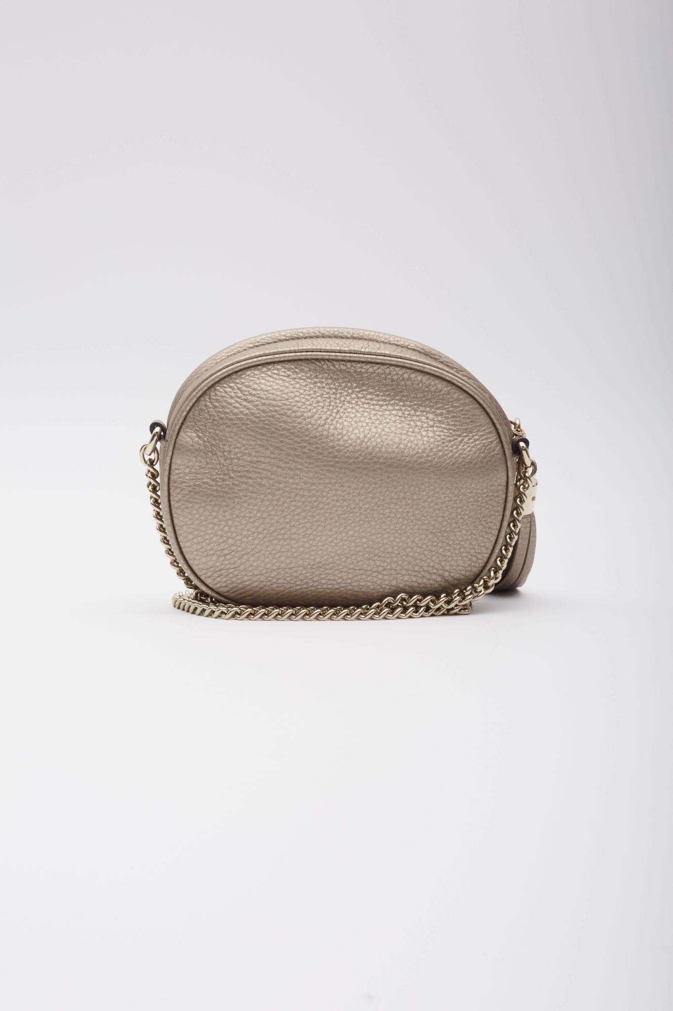 De las mujeres Mini bolso cruzado Soho Disco de piel dorada metalizada Gucci en venta