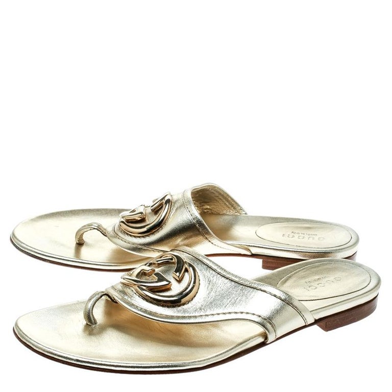 Gucci Metallic Gold Leather GG logo Thong Slipper Size 37 For Sale at 1stDibs
