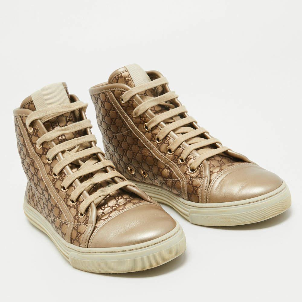 Gucci Metallic Gold Leather Guccissima High Top Sneakers Size 37 In Fair Condition In Dubai, Al Qouz 2