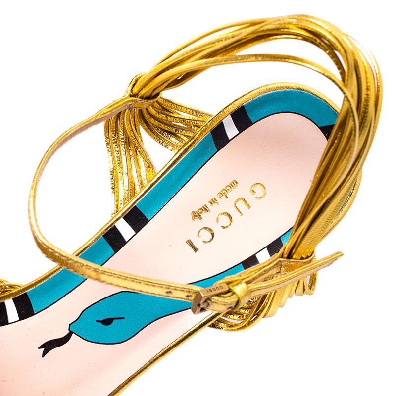 Gucci Metallic Gold Leather Strappy Allie Knot Sandals Size 37.5 In Fair Condition In Dubai, Al Qouz 2