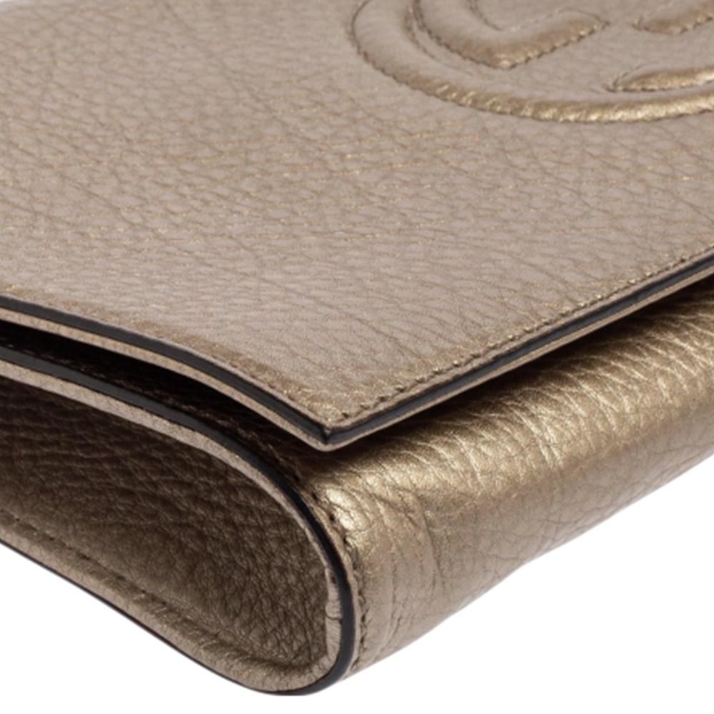 Women's Gucci Metallic Gold Pebbled Leather Soho Clutch