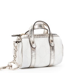 GUCCI metallic gold white monogram canvas micro Boston bag char