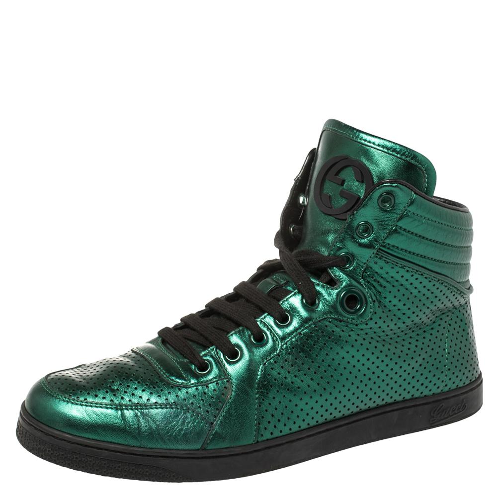 Gucci's sneakers are an example of style and comfort coming together. Crafted from metallic leather in a perforated design, these sneakers flaunt details like the quilted counters, laces, and the raised high top. You wouldn't want to miss out on