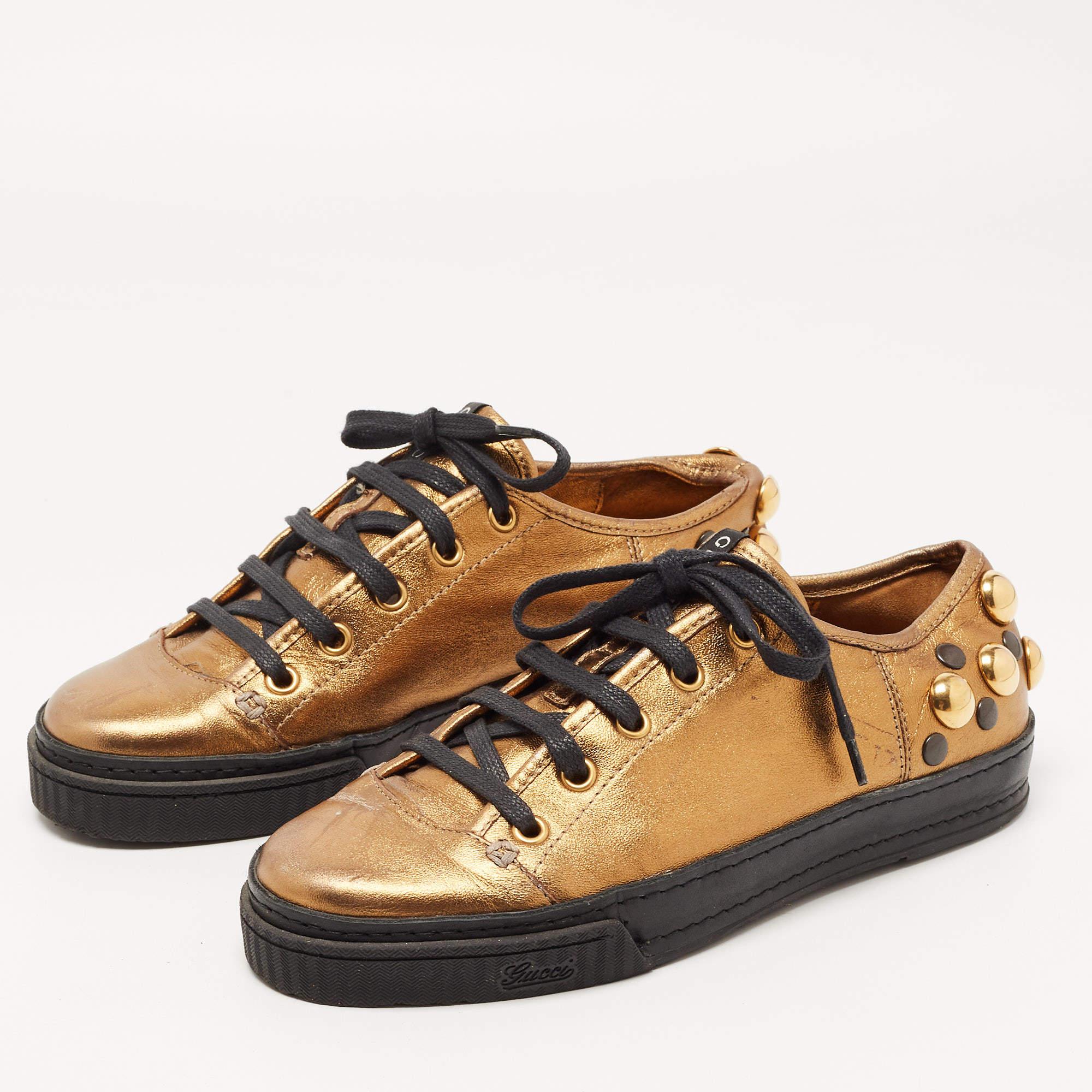 Coming in a classic silhouette, these designer sneakers are a seamless combination of luxury, comfort, and style. These sneakers are finished with signature details and comfortable insoles.