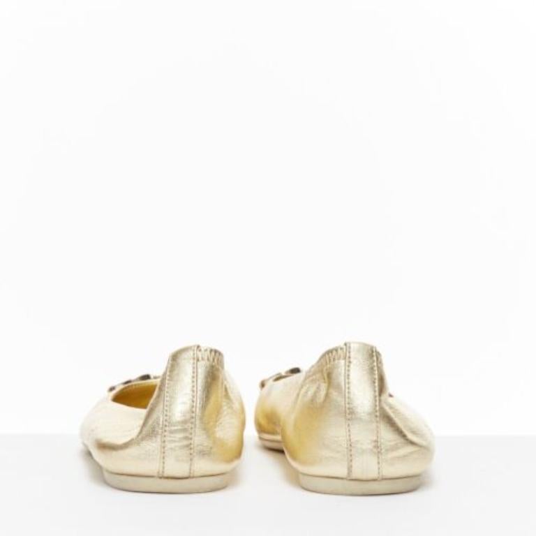 De las mujeres Bailarinas de punta redonda con hebilla Horsebit en oro claro metalizado GUCCI EU36 en venta