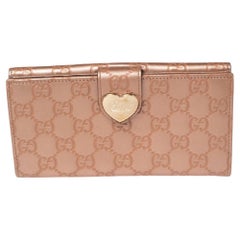 Gucci Metallic Rose Gold Guccissima Leather Flap Continental Wallet