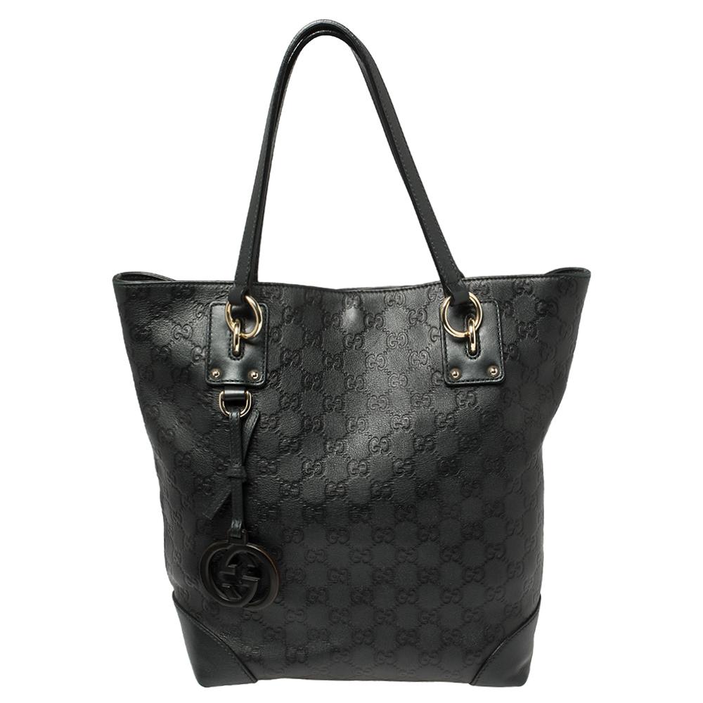 The Charm tote from Gucci is very stylish and functional too! It has been crafted from the signature Guccissima leather and designed with dual handles. The interior is lined with fabric and is spacious enough to accommodate all your daily