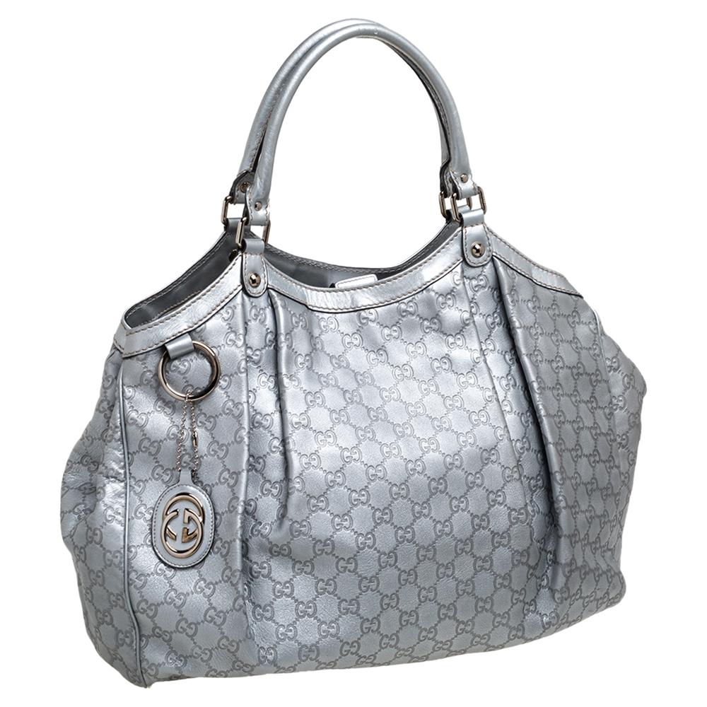 silver metallic handbag