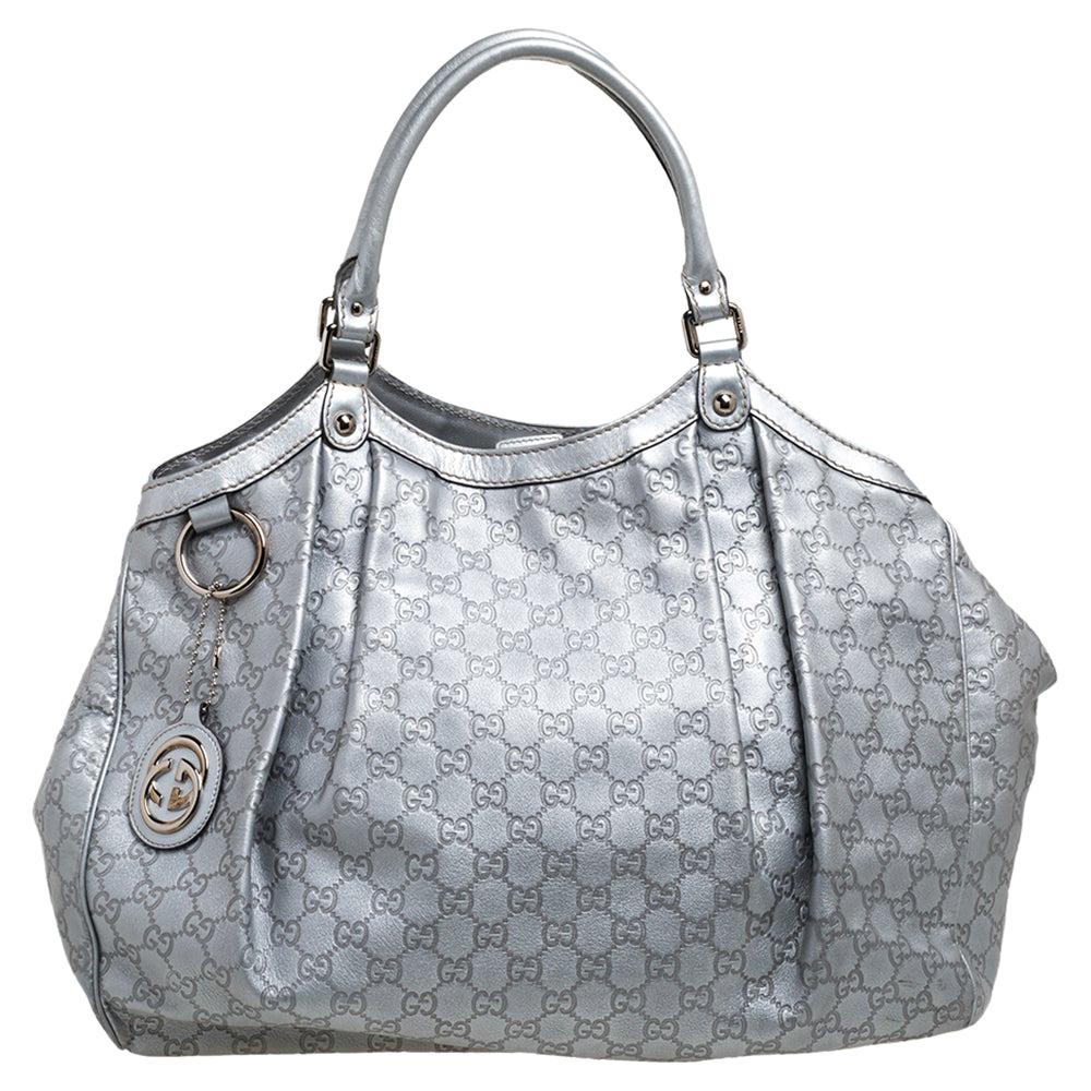 Gucci Metallic Silver Guccissima Leather Large Sukey Tote at 1stDibs |  silver metallic handbag, silver gucci bag, gucci silver bag