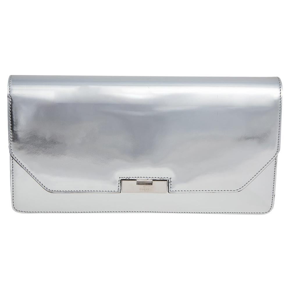 Gucci Metallic Silver Leather 58 Clutch at 1stDibs | gucci metallic leather  evening bags, metallic silver purses, gucci silver clutch