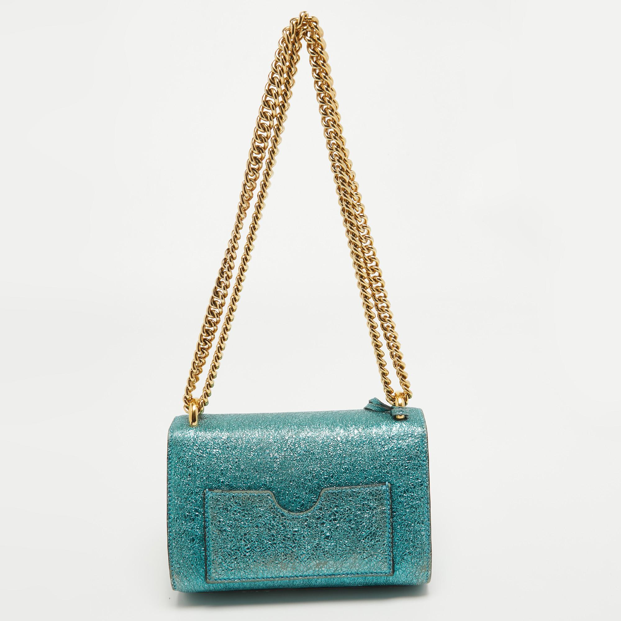 Thoughtful details, high quality, and everyday convenience mark this shoulder bag for women by Gucci. The bag is sewn with skill to deliver a refined look and an impeccable finish.

Includes: Original Dustbag, Keys


