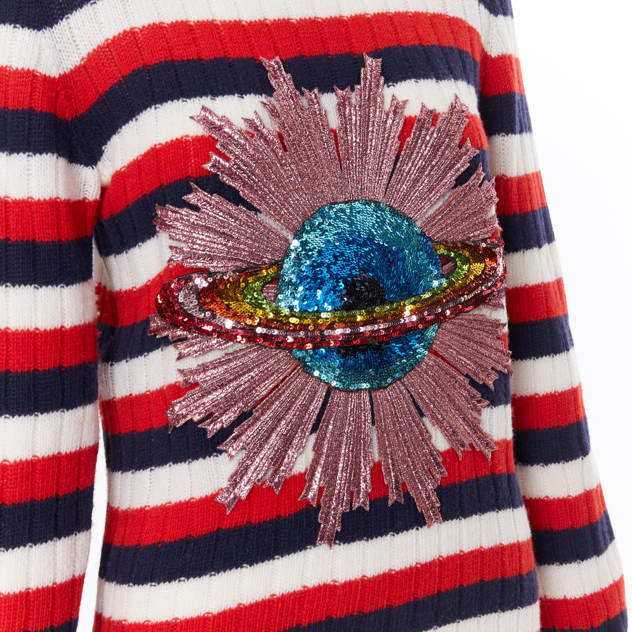 GUCCI MICHELE 100% wool red blue white striped UFO sequins embellished sweater M
Brand: Gucci
Designer: Alessandro Michele
Model Name / Style: Wool sweater
Material: Wool
Color: Multicolour
Pattern: Other; UFO 
Extra Detail: UFO sequins and pink