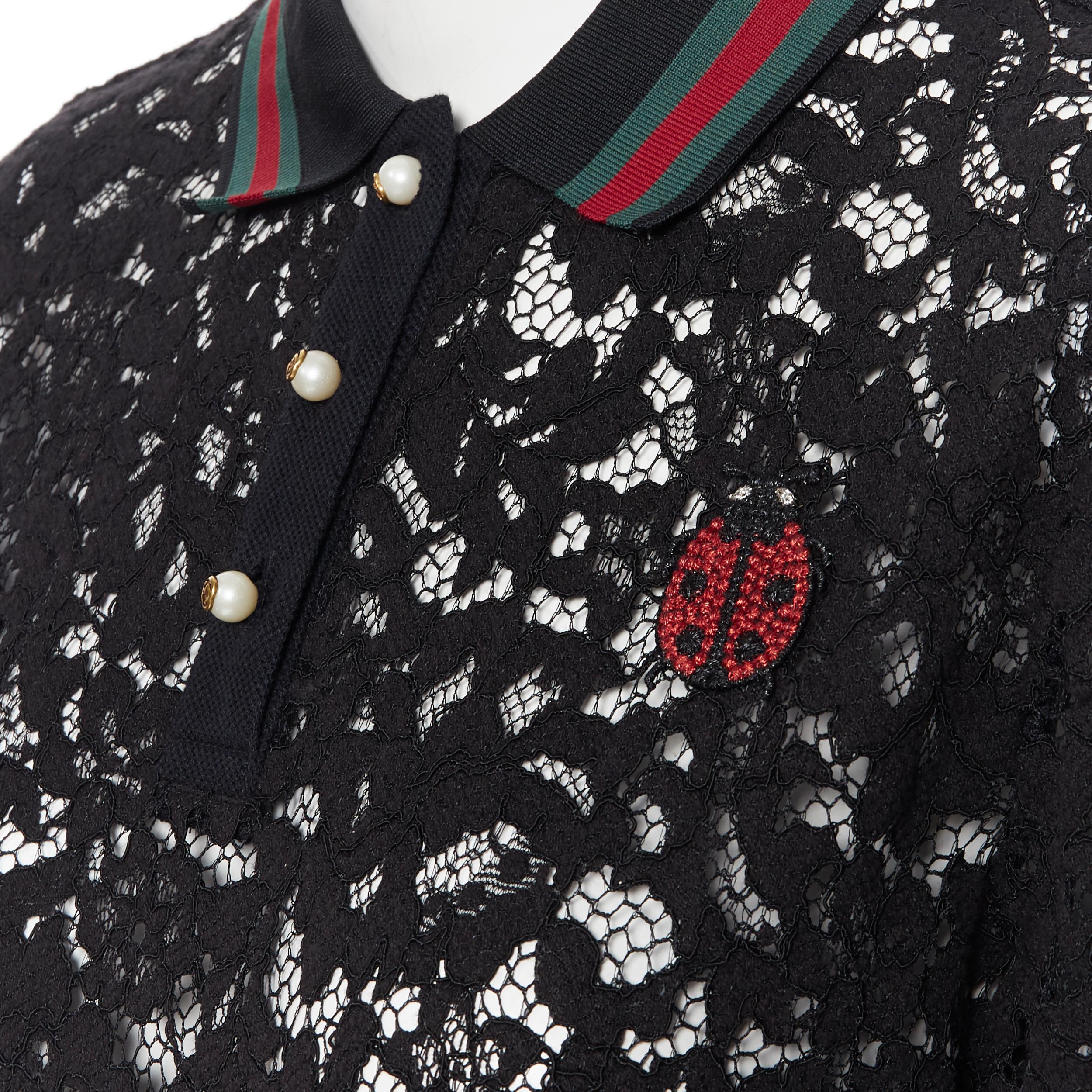 GUCCI MICHELE black floral lace signature red green web pearl button polo top L
Brand: Gucci
Designer: Alessandro Michele
Model Name / Style: Lace polo
Material: Lace; composition label removed
Color: Black
Pattern: Floral
Closure: Button
Extra