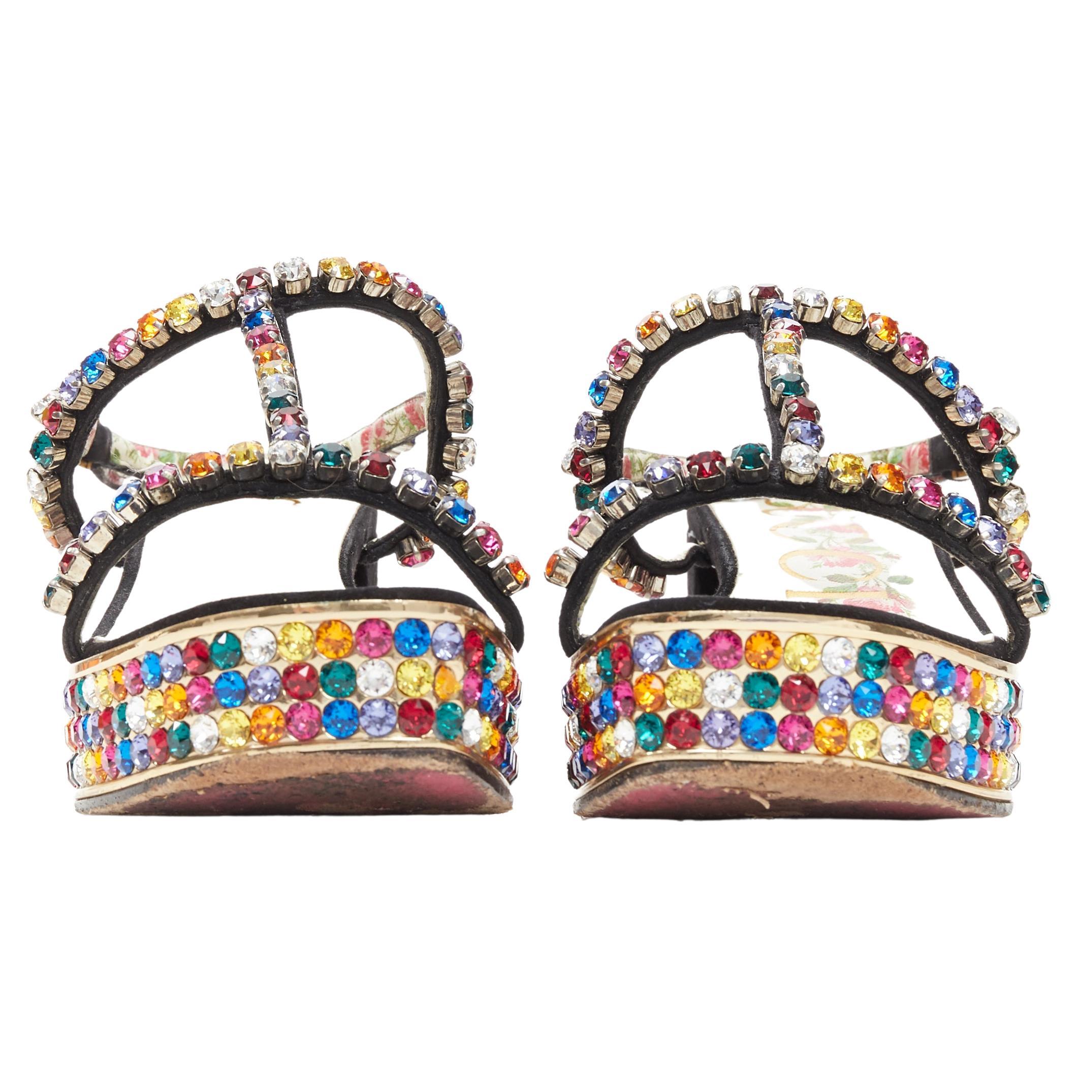 GUCCI Michele Mira rainbow jewel strass crystal block heel T-strap sandal EU35.5 
Reference: TGAS/A04250 
Brand: Gucci 
Designer: Alessandro Michele 
Model: Mira sandal 
Material: Suede 
Color: Multicolour 
Pattern: Solid 
Closure: Ankle Strap 
Made