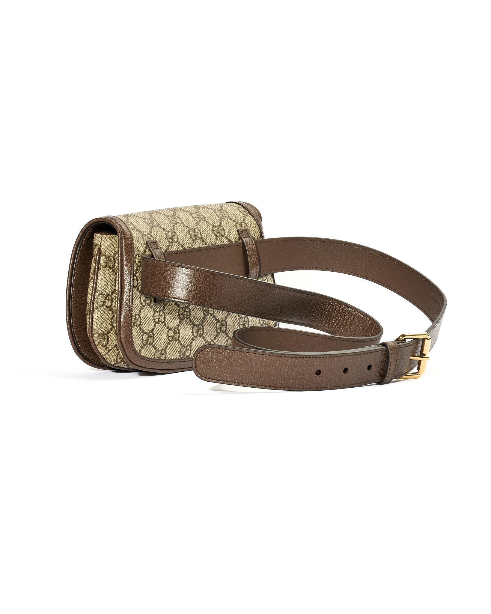 Gucci signature bag, Blondie line, micro size, made of canvas in the classic gg supreme pattern with brown leather inserts and gold hardware. Featuring a front flap with double clip closure, internally lined with beige canvas, roomy for essentials.