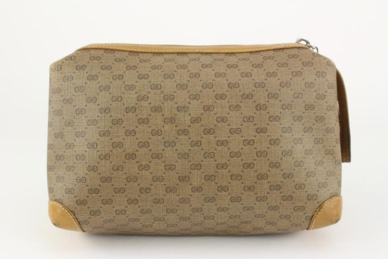 Gucci Pre-owned 2000 Embossed Logo Cosmetic Pouch - Brown