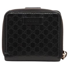 Gucci Micro Guccissima kompakte Portemonnaie aus Leder Schwarz
