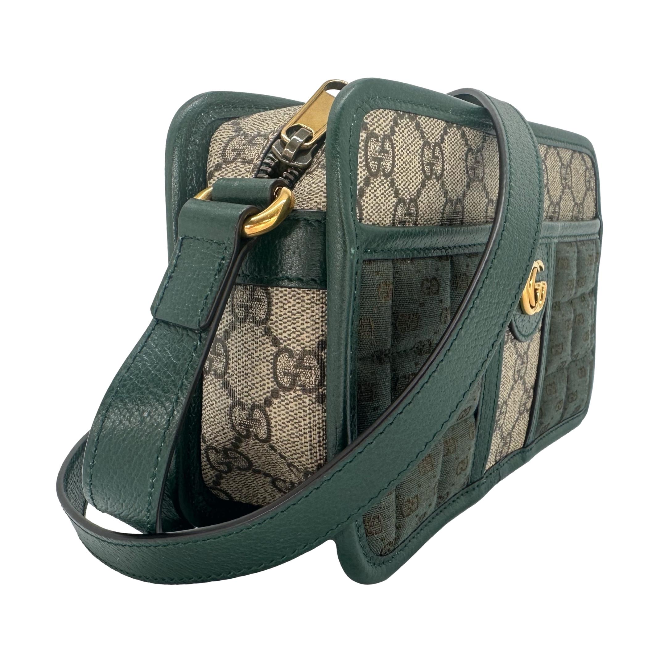 Gucci Microguccisima GG Green Canvas Pattern Unisex Crossbody Shoulder Bag, 2023. The vintage classic mini Gucci GG monogram pattern takes a new look for this special limited edition unisex bag released in the Fall of 2023 in Singapore. The 
