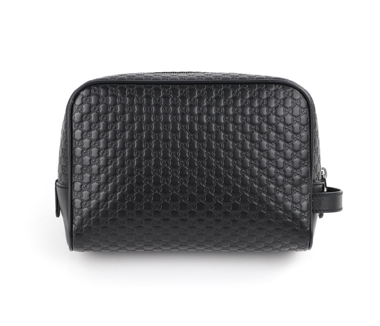 GUCCI “Microguccissima” Black Embossed Leather Zip Cosmetic Toiletry Travel Bag at 1stDibs