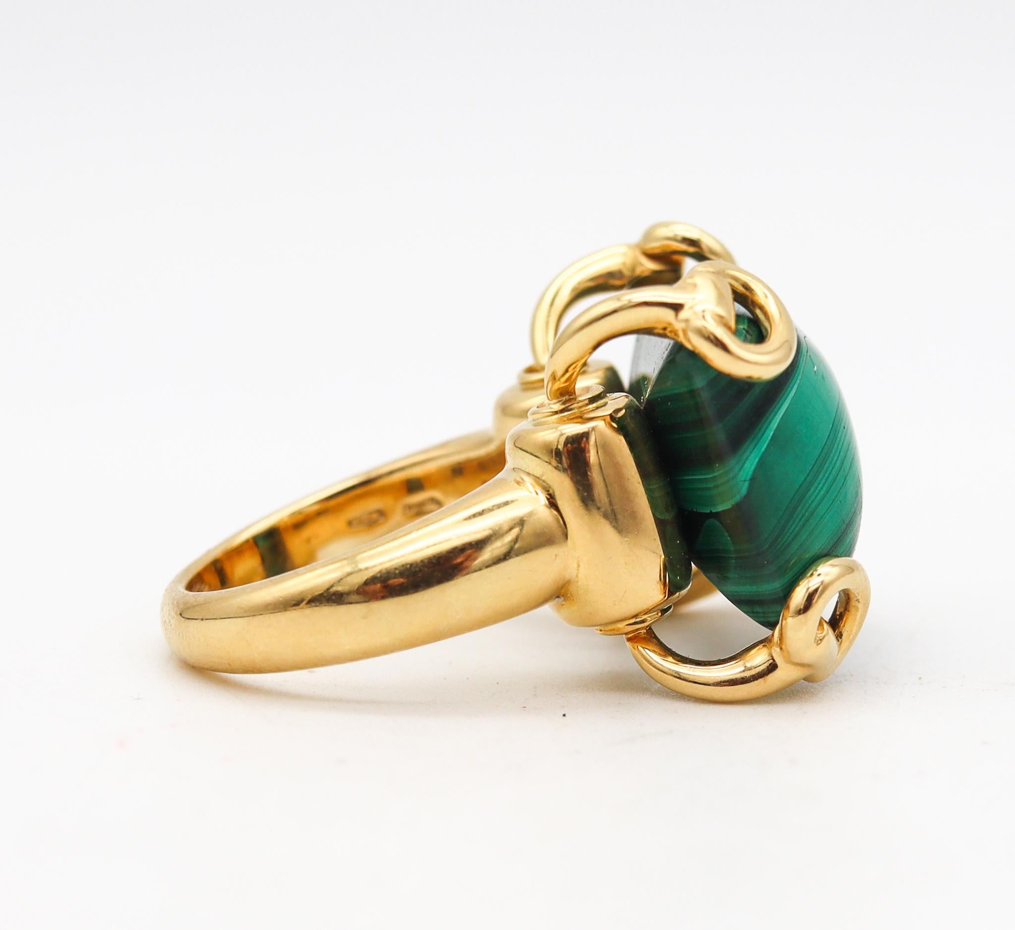 A cocktail ring with malachite designed by Gucci.

This large horse-bit cocktail ring is one of the most Iconic and popular models created by the fashion and jewelry house of Gucci, in the late 20th century. This beautiful ring has been crafted in
