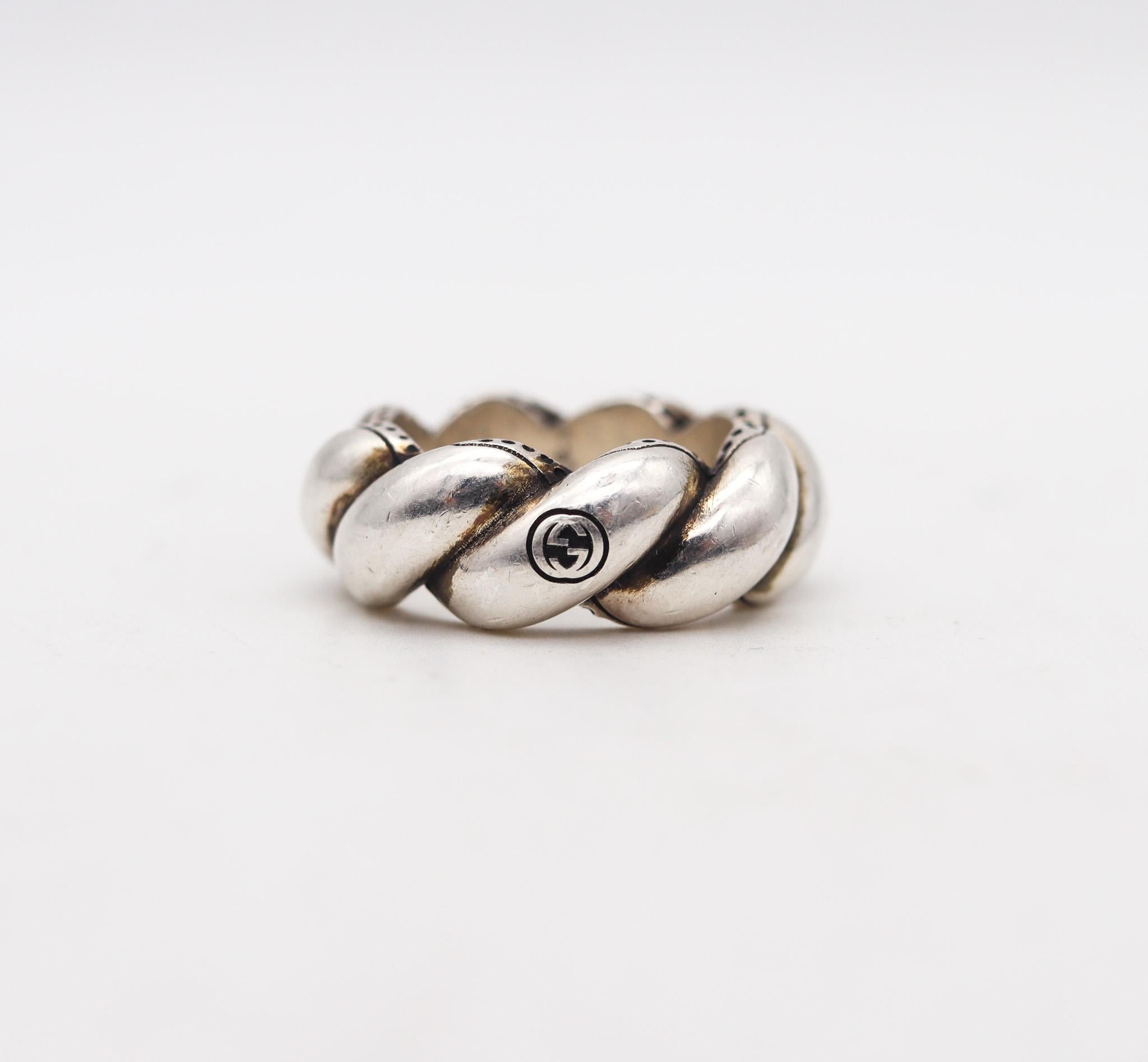 Twisted ring designed by Gucci.

Beautiful vintage ring, created in Milano Italy by the luxury house of Gucci. This ring is has been crafted in the shape of a San Marcos twisted band in solid .925/.999 sterling silver with high polished finish. This