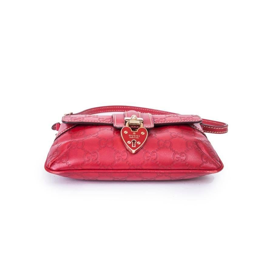 Women's GUCCI Mini Bag in GG Embossed Red Leather