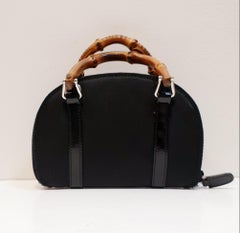 Cartera/bolso cruzado Gucci mini con asa de bambú