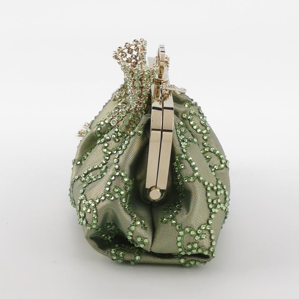 Grigio Gucci Mini Clutch in nylon verde con Monogram e Fiocco e Catena in vendita