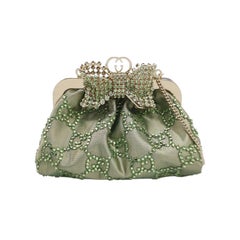 Gucci Mini Clutch in nylon verde con Monogram e Fiocco e Catena