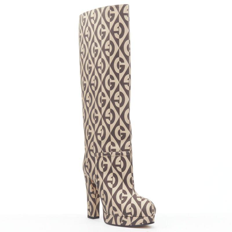 GUCCI Mini Diamond B Face GG monogram jacquard platform boot EU36
Reference: TGAS/B01666
Brand: Gucci
Designer: Alessandro Michele
Model: Mini Diamond B Face G beige Cocao boots
Collection: Runway
Material: Fabric
Color: Brown
Pattern: