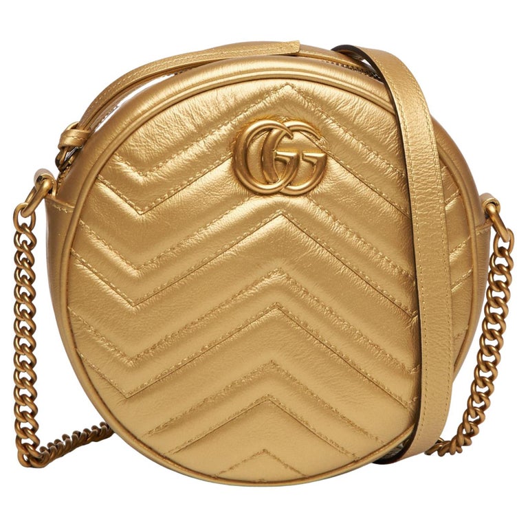 Gucci Mini sac à bandoulière rond GG Marmont doré (550154) En vente sur  1stDibs