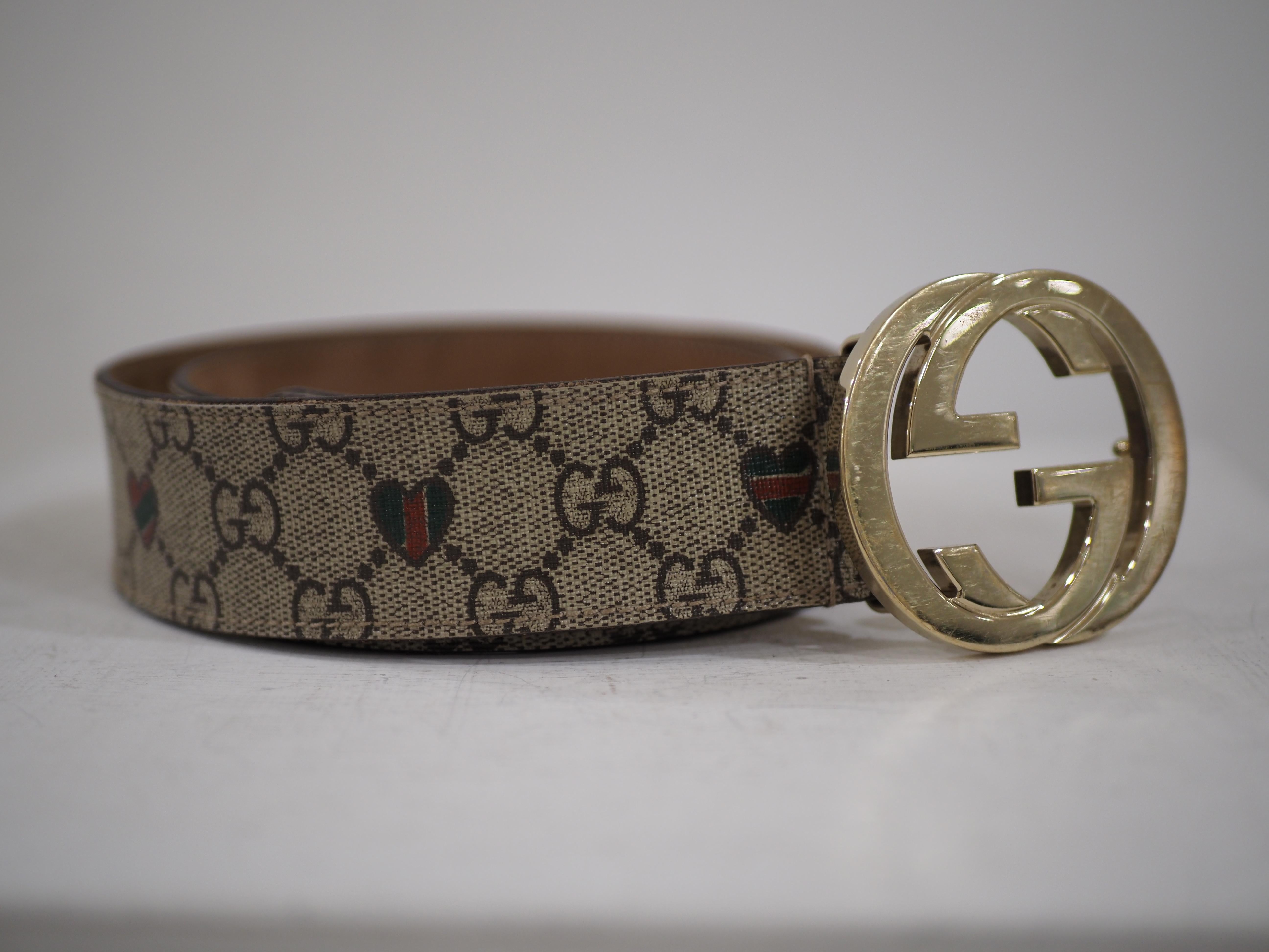 Brown Gucci monogram belt