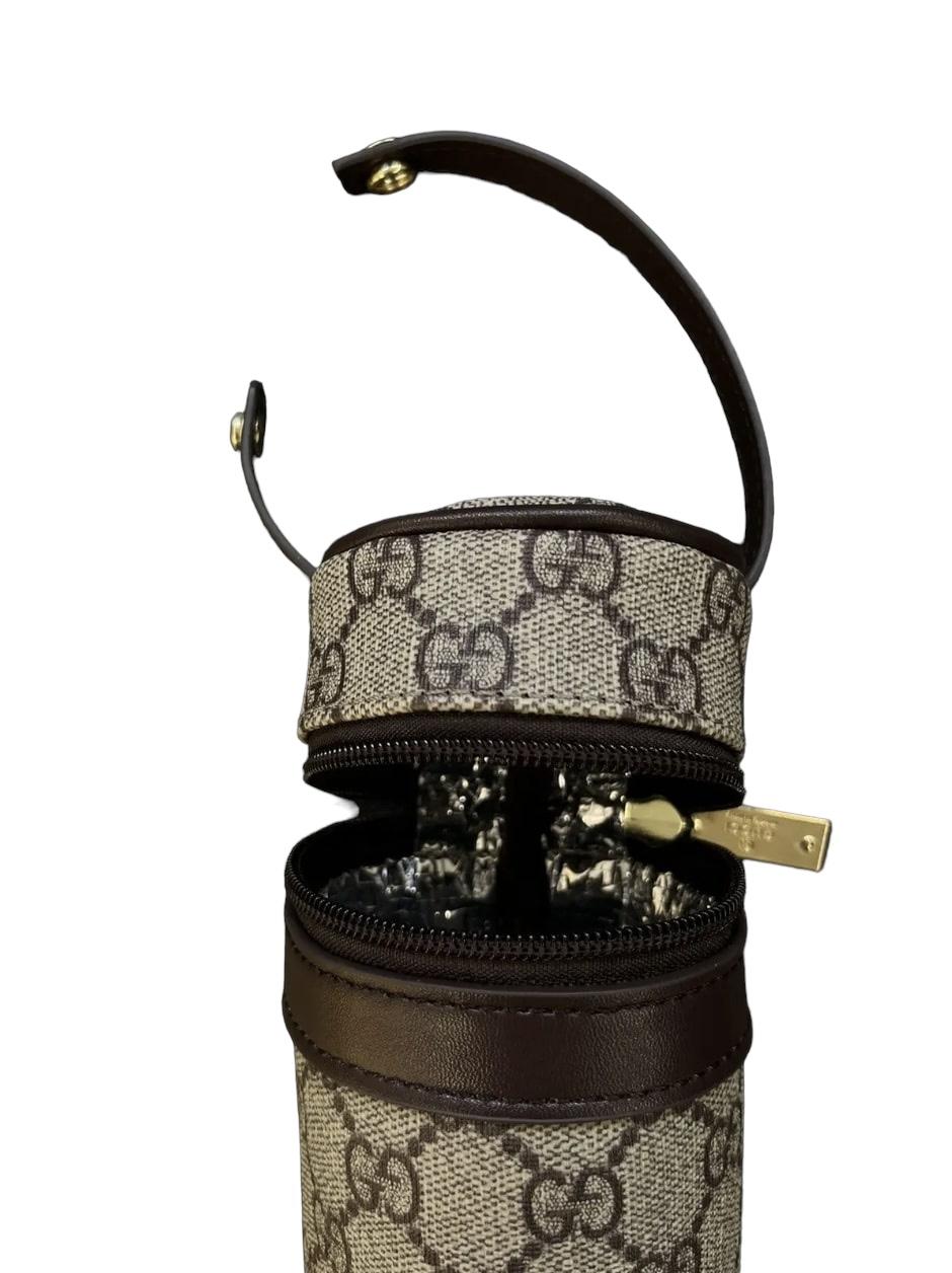 Gucci
Monogram Bottle Holder

Iconic Gucci bottle holder in a monogram pattern, fully insulated. Can be clipped on to a bag or your pants during a festival. In perfect condition, made in Italy.