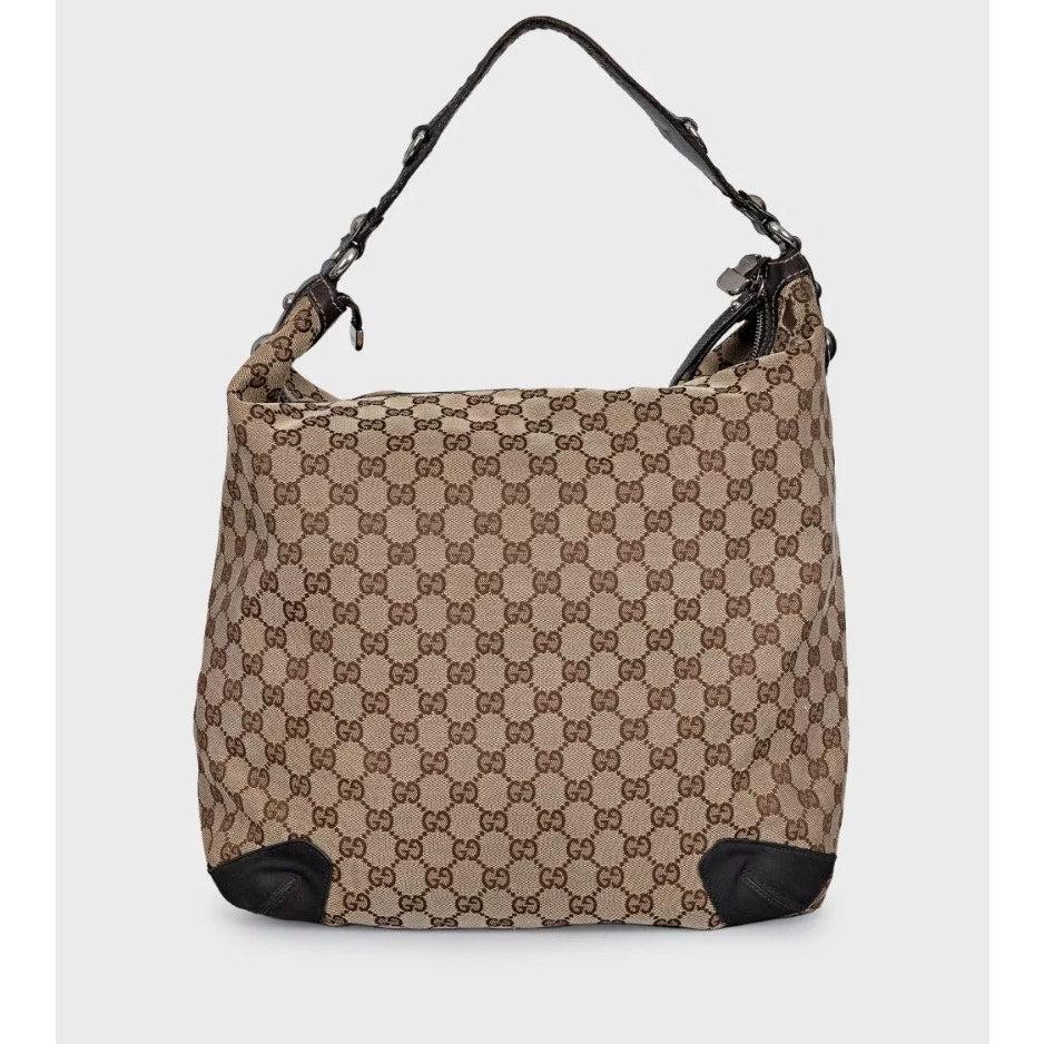 Marron Sac hobo en toile et cuir Monogram de Gucci en vente