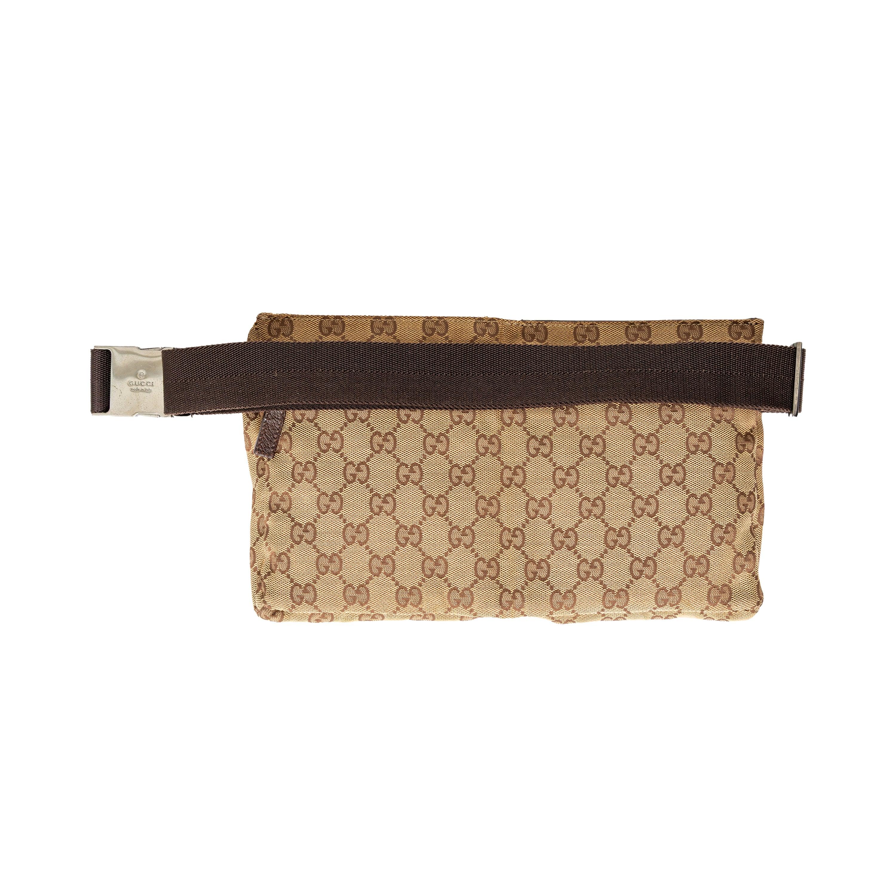 Crafted with GG monogram beige canvas and brown leather trim, this bag features adjustable straps, dual compartments, a rear zip pocket, and can be worn as a belt or crossbody bag.
 Remarks: There are some scratches and fading on the leather. 
