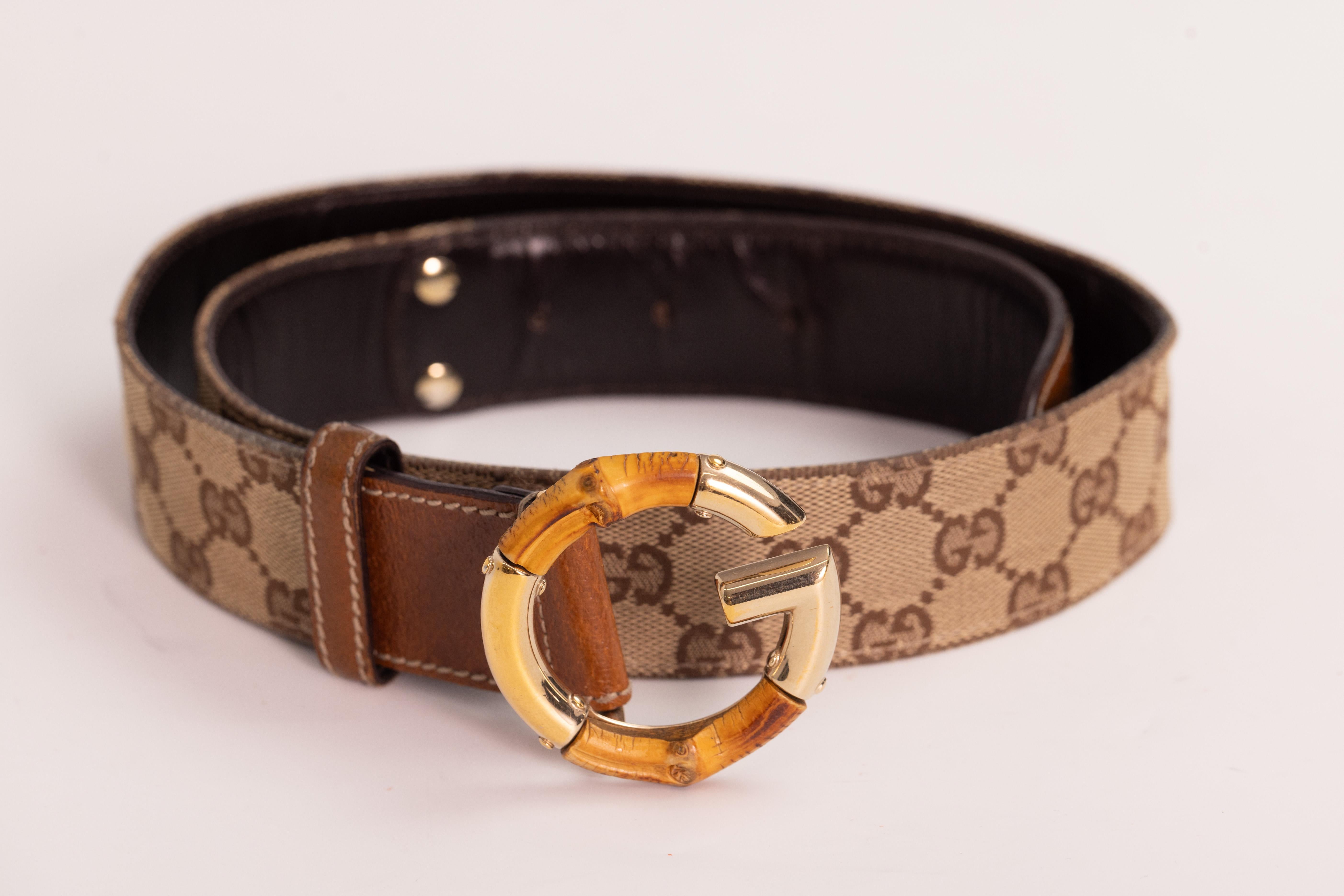 This Gucci belt features monogram print on canvas, leather details, a bamboo logo G buckle and brass accents.

Color: Ebony GG monogram
Material: Canvas with bamboo accents
Model No.: 138456
Measures: L 36” x W 1.5”
Size: 80 cm / 32 inch
Comes With: