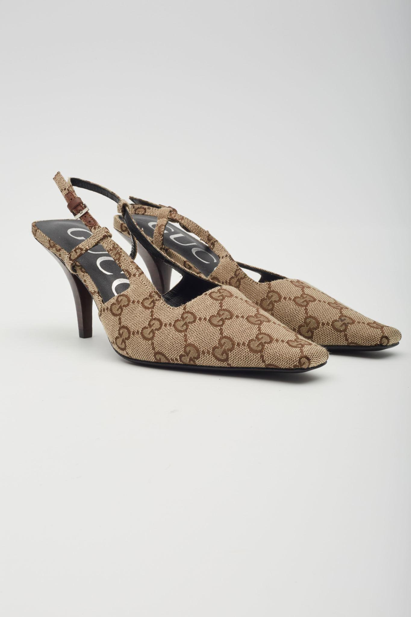Retail.
Color: beige / ebony
Material: monogram
Model No. 675420
Made in Italy

EU 38 / US 7

Heel Height: 75 mm / 3”
Condition: Excellent.
Comes with: dust bag