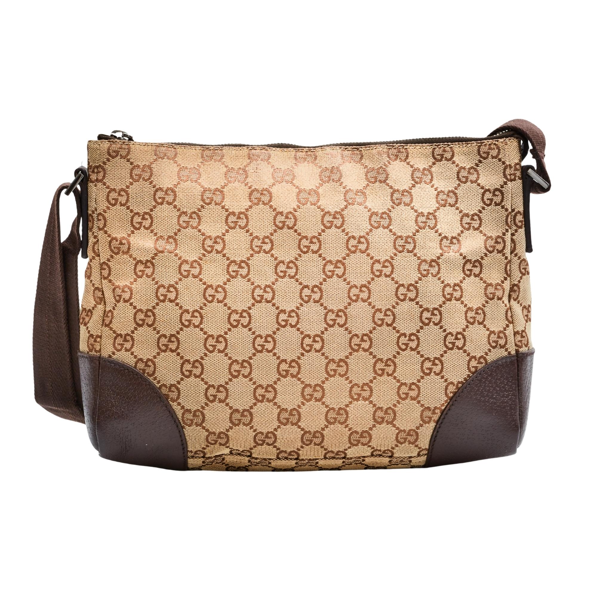 This bag is made with beige monogram canvas with brown leather trim. Featuring a top zip closure, one internal zip pocket and a brown interior.

COLOR: Beige monogram with brown trim. 
MATERIAL: Canvas with leather trim.
ITEM CODE: 114273
MEASURES: